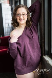 Beautiful Woman in Purple Sweater During West Palm Beach Boudoir Photography Session